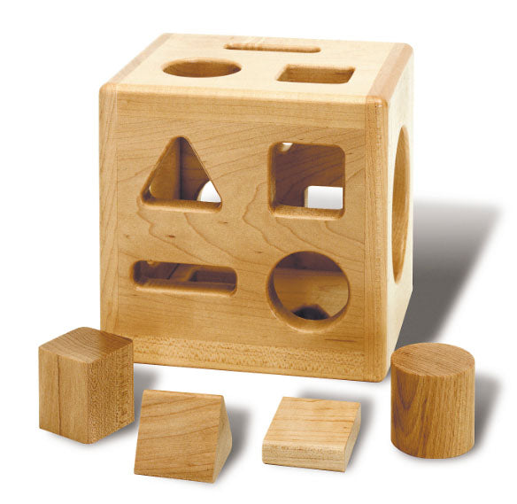 Maple Shape Sorter solid hardwood cube with geometric shape cutouts and matching wooden shapes for sorting and skill development