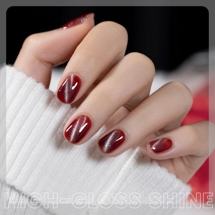 High-gloss shine silver white cat eye gel polish amber red jelly layering effect captivating depth light-catching vibrancy