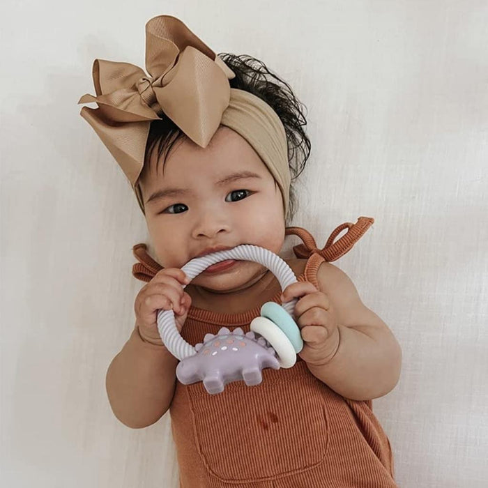 Itzy Ritzy Ritzy Rattle Silicone Teether - Lilac Dino