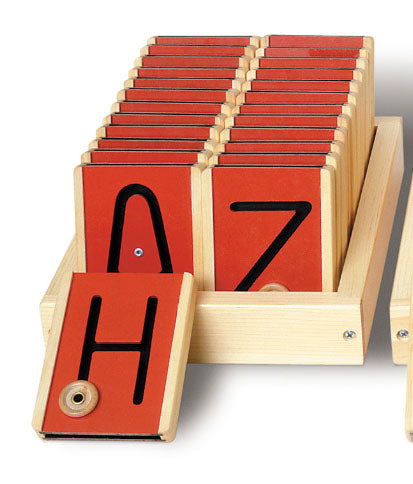 Motor Letters Learning Tool (Uppercase) with tactile wooden tiles, black uppercase letters, and movable buttons in a wooden tray