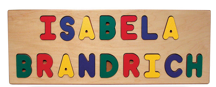 Personalized Name Puzzle (Two Line) with colorful removable wooden letters spelling two names on a natural wood board