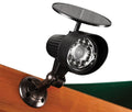 Playset Solar Spot Light with 12 LED bulbs, black adjustable mount on wooden outdoor swing set, solar-powered motion-activated light