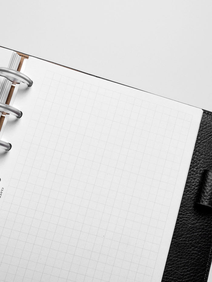 Insert in use inside a black leather planner.