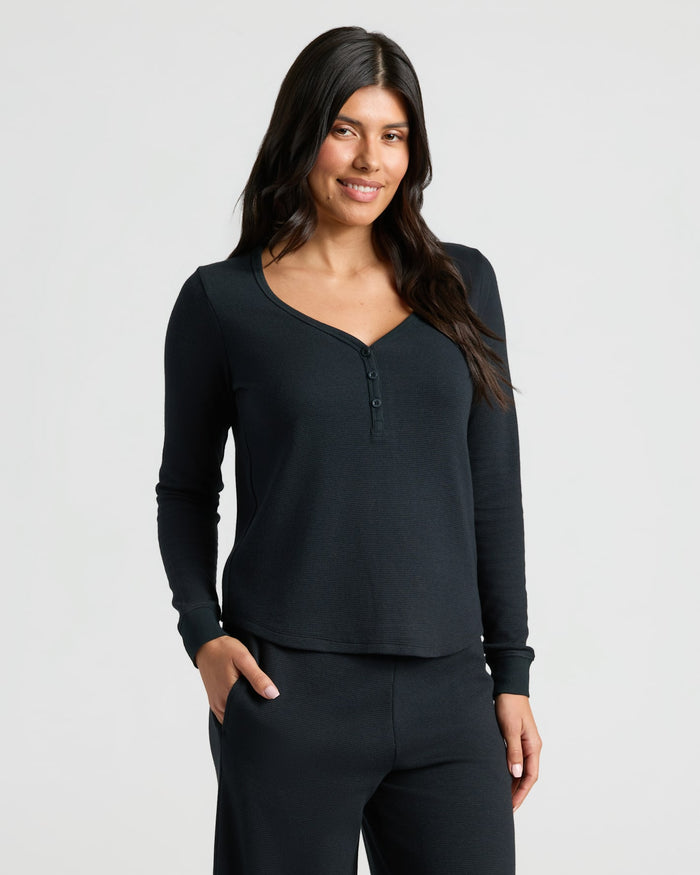 Womens Black Waffle Long Sleeve Henley & Waffle Leg Pant 2-Pack worn by model. MODEL_INFO: Sophia is 5'8", wearing a size XS