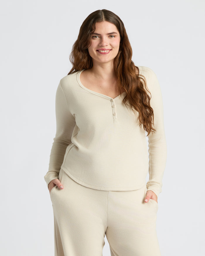Woman modeling Womens Oatmeal Waffle Long Sleeve Boxy Henley lounge set. MODEL_INFO: Margaret is 5'10", wearing a size L